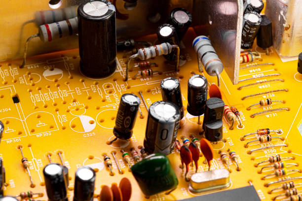 istock Close up of components and microchips on old PC circuit board 1364396979