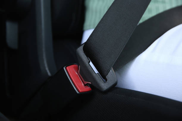 istock Driver with fastened safety belt in car, closeup 1364396998