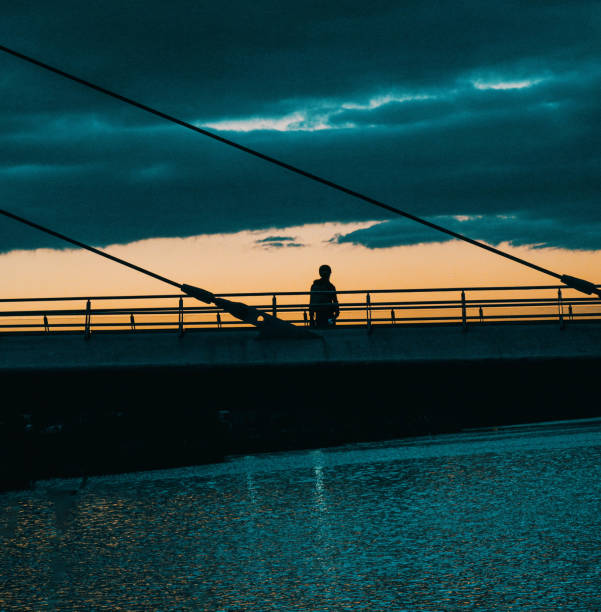 istock Sunset silhouettes at Salford Quays 1364398375