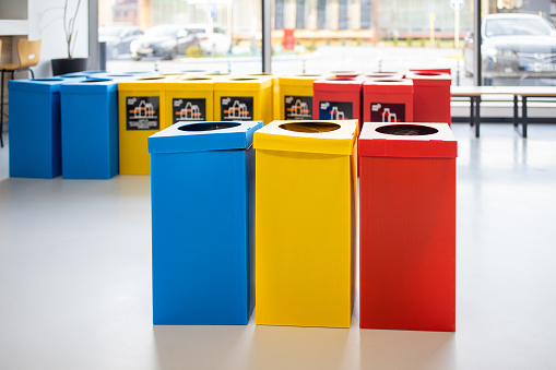 Multicolored recycling bins at the modern corporate building