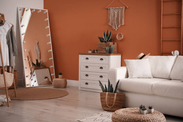 istock Stylish living room interior with comfortable sofa and potted plants 1364402246