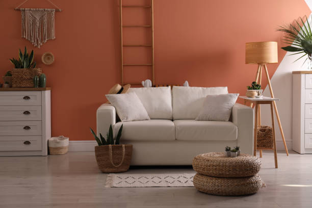 istock Stylish living room interior with comfortable sofa and potted plants 1364403341