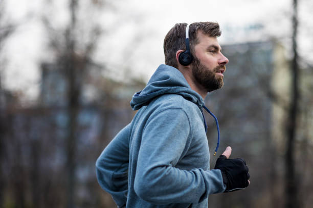 istock Young man running in the city 1364406357