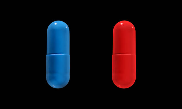 黒の背景に分離赤と青の丸薬のクローズアップ.クリッピングパス。 - vitamin pill red pill capsule ストックフォトと画像