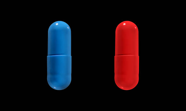 close up of red and blue pills isolated on black background. clipping path. - antibiotic red medicine healthcare and medicine imagens e fotografias de stock