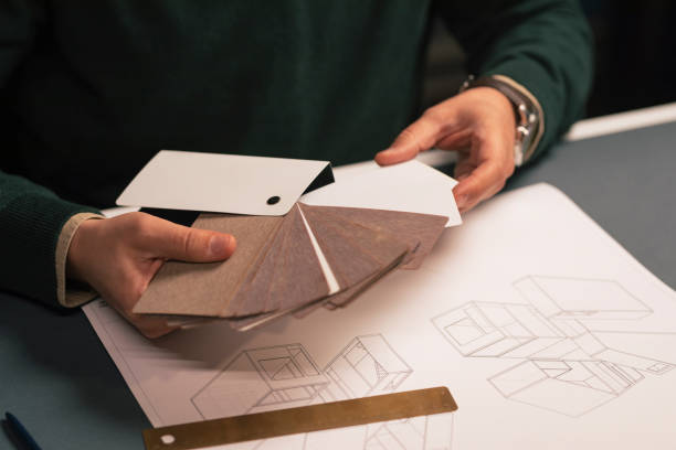 istock An Unrecognizable Man Choosing A Suitable Color For His Project He Has Made A Sketch Of 1364408280