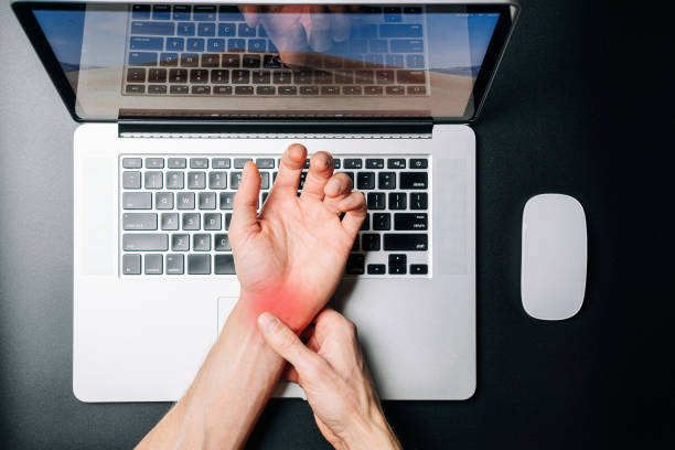 istock Arthritis hand. Arthritis office syndrome is consequence of computer. Hand pain in man injury wrist. Health care and medical concept. 1364408995