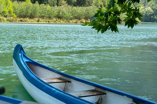 Blue and White Wooden Canoes in Lake in Turkey
