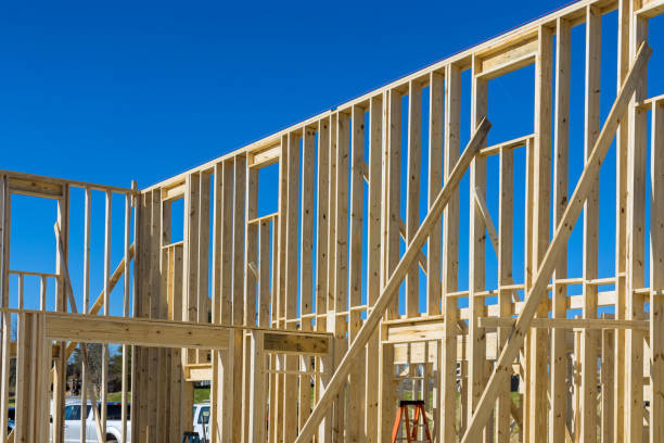 istock Framed new construction of residential construction house framing 1364409339