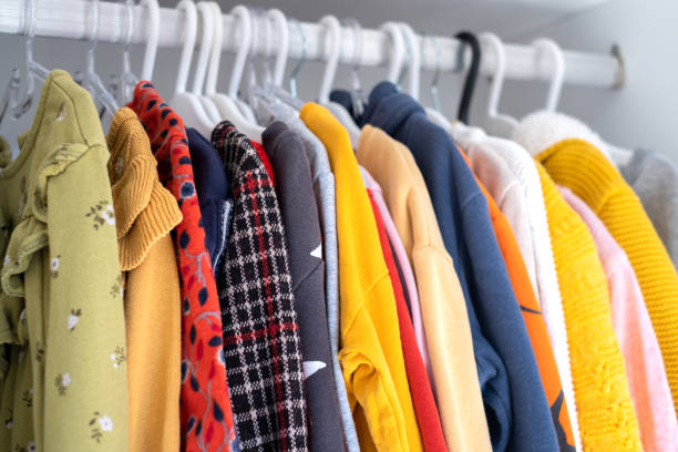 istock Kids Clothes On Hangers 1364409341