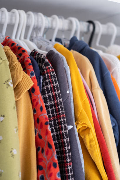 istock Kids Clothes On Hangers 1364409424