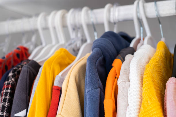 istock Kids Clothes On Hangers 1364409463