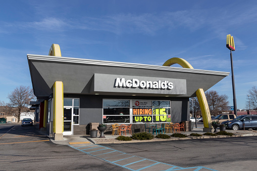 Lafayette - Circa December 2021: McDonald's Restaurant. McDonald's is offering employees higher hourly wages, paid time off, backup child care and tuition payments.