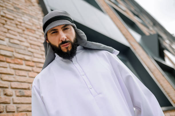 istock Man in traditional arabian clothing looking serious 1364413590