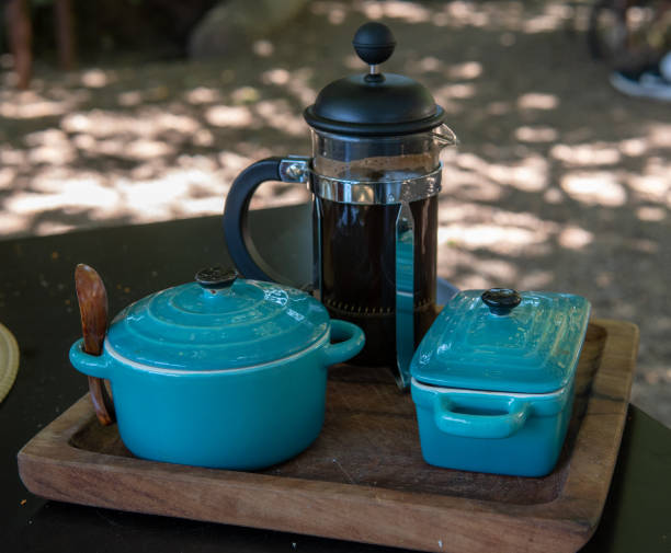 istock ceramic dishes with french press coffee 1364414071
