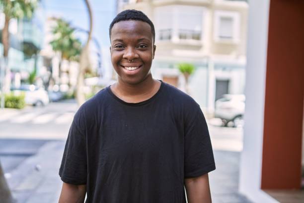 Young african american transgender smiling confident at street stock photo