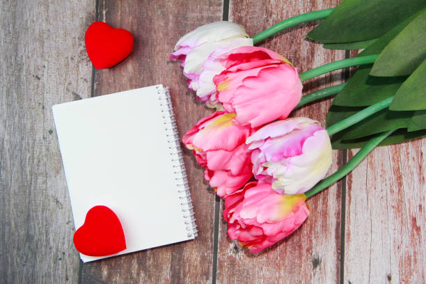 istock flowers pink tulips and red heart 1364418715