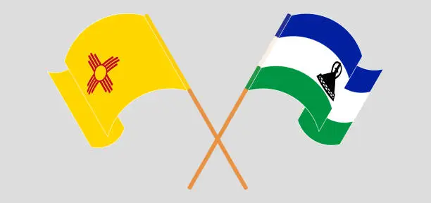 Vector illustration of Crossed and waving flags of the State of New Mexico and Kingdom of Lesotho