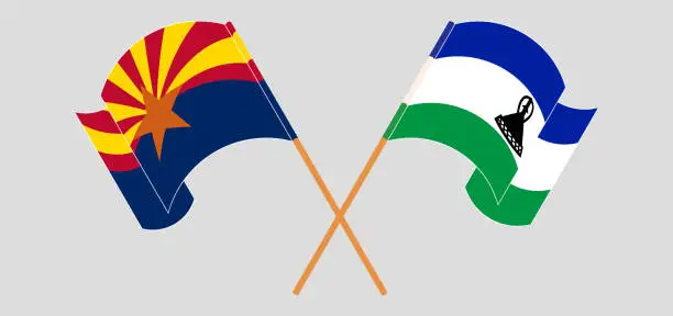 Vector illustration of Crossed and waving flags of the State of Arizona and Kingdom of Lesotho