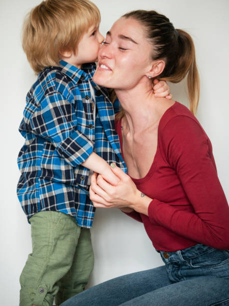 istock Beautiful mother with her young son 1364420367
