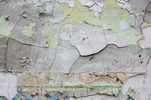 istock Texture of old wall with damaged plaster. 1364421338
