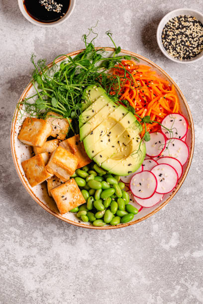 istock Buddha bowl asian salad with tofu cheese. 1364422035