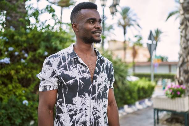 istock Young african american man smiling confident at park 1364422409