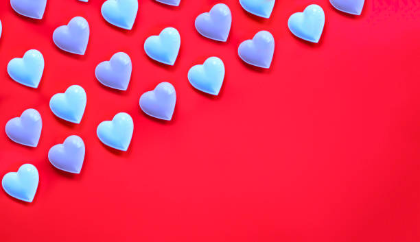 istock Valentine's day card, pattern. White and light pink hearts on red. Isometric 1364423976