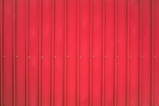 A red steel background can be use for design, backgrounds, wallpapers