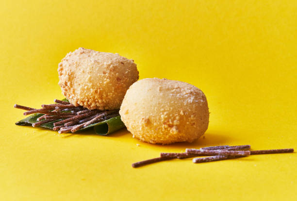 istock Two delicious mochis on a yellow background 1364429061