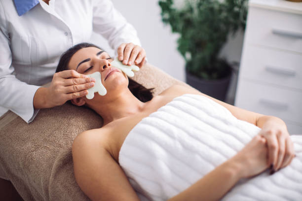istock Gua sha - traditional Chinese massage with stones 1364429248