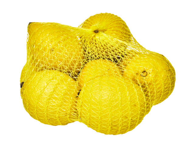 istock Mesh of lemons isolated on a white background 1364429349