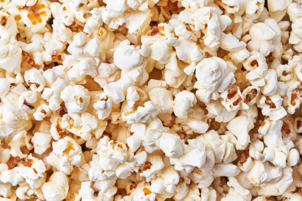 istock Bunch of salty popcorns texture 1364431172