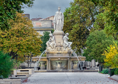 A water fountain with statues in Florence, Italy