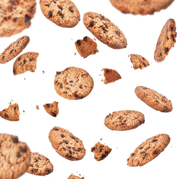 istock Delicious chocolate cookies flying isolated on a white background 1364431892