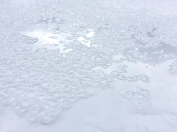 Snow on the white metal background