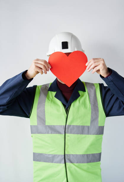 istock Building contractor with red heart as Valentine's Day symbol 1364442496