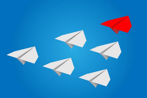 istock Individual red leader paper plane lead other on blank copy space background. Business and leadership concept 1364444207