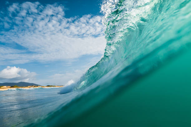 istock Wave in Atlantic ocean. Glassy turquoise wave sunny day 1364447185