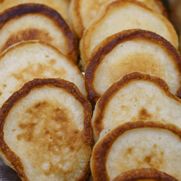 istock Freshly baked small pancakes. Macro photography 1364447679