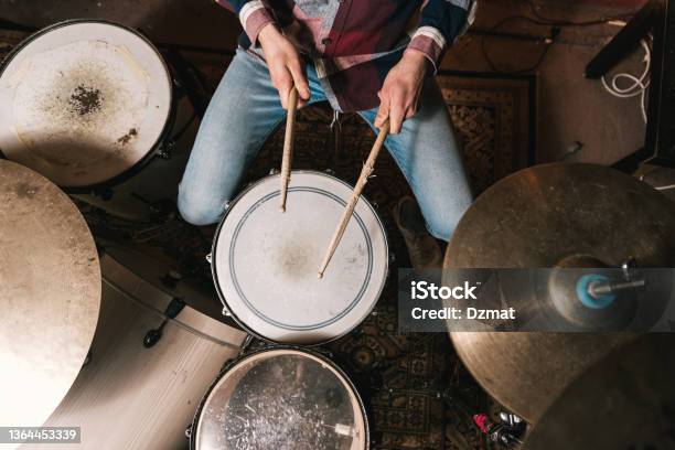 Man Playing Music On Drum Set In Studio Stock Photo - Download Image Now - Drummer, High Angle View, Rehearsal