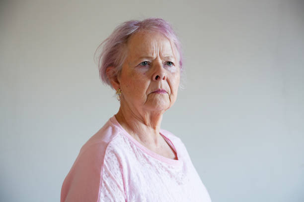 istock serious senior woman portrait 1364454757