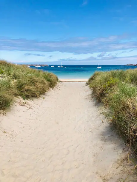 Sandy path to Braye Beach in Alderney, Channel Islands