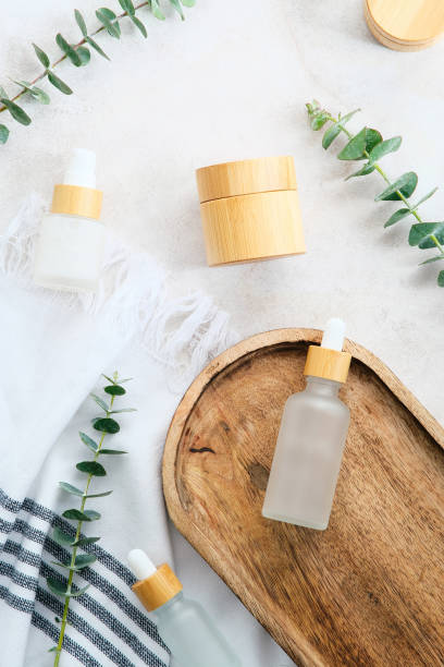 istock SPA natural beauty products set and eucalyptus leaves on stone table. 1364454905