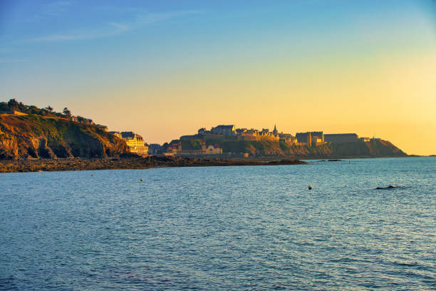 Great sunset on the beach near the town of Grandville, Normandy France.