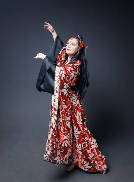 istock Beautiful young woman in red traditional Chinese costume 1364458376