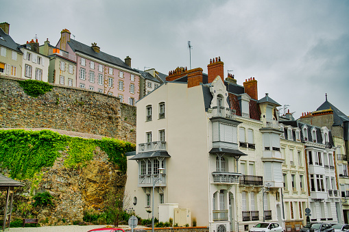 Normandy, France, August 27, 2019: Looking at historic buildings at the city of Granville wich is a commune in the Manche department and region of Normandy, northwestern France. It is also the hometown of Christian Dior, best known as the founder of one of the world's top fashion houses Christian Dior SE, which is now owned by parent company LVMH.