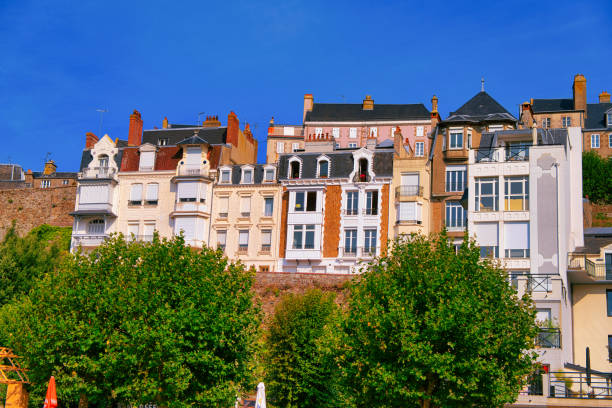 Normandy, France, August 27, 2019: Looking at historic buildings at the city of Granville wich is a commune in the Manche department and region of Normandy, northwestern France. It is also the hometown of Christian Dior, best known as the founder of one of the world's top fashion houses Christian Dior SE, which is now owned by parent company LVMH.