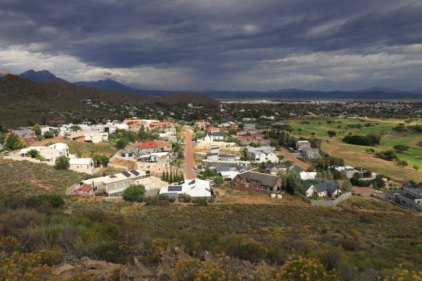 istock Dramatic clouds over Fairway Heights in Worcester, South Africa. 1364461981