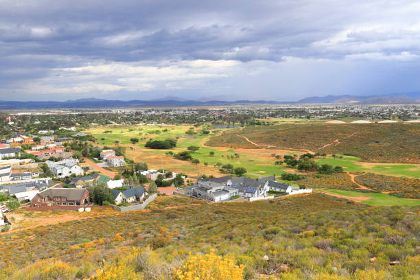 istock Dramatic clouds over Fairway Heights in Worcester, South Africa. 1364461986